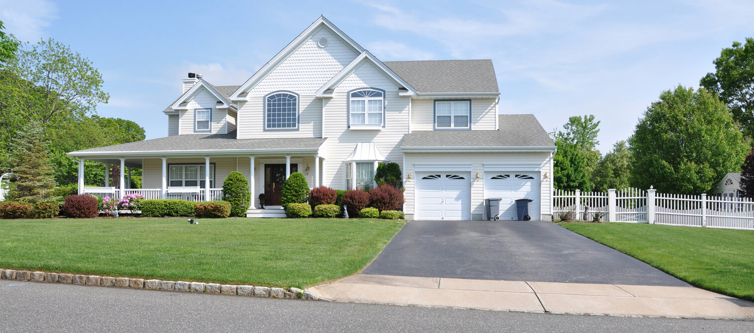 image of modern home with sidewalk front lawn